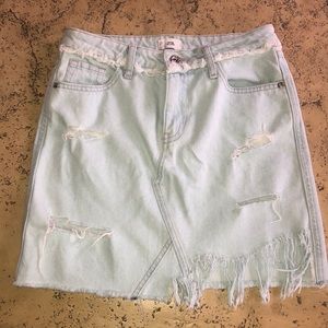 Distressed denim skirt